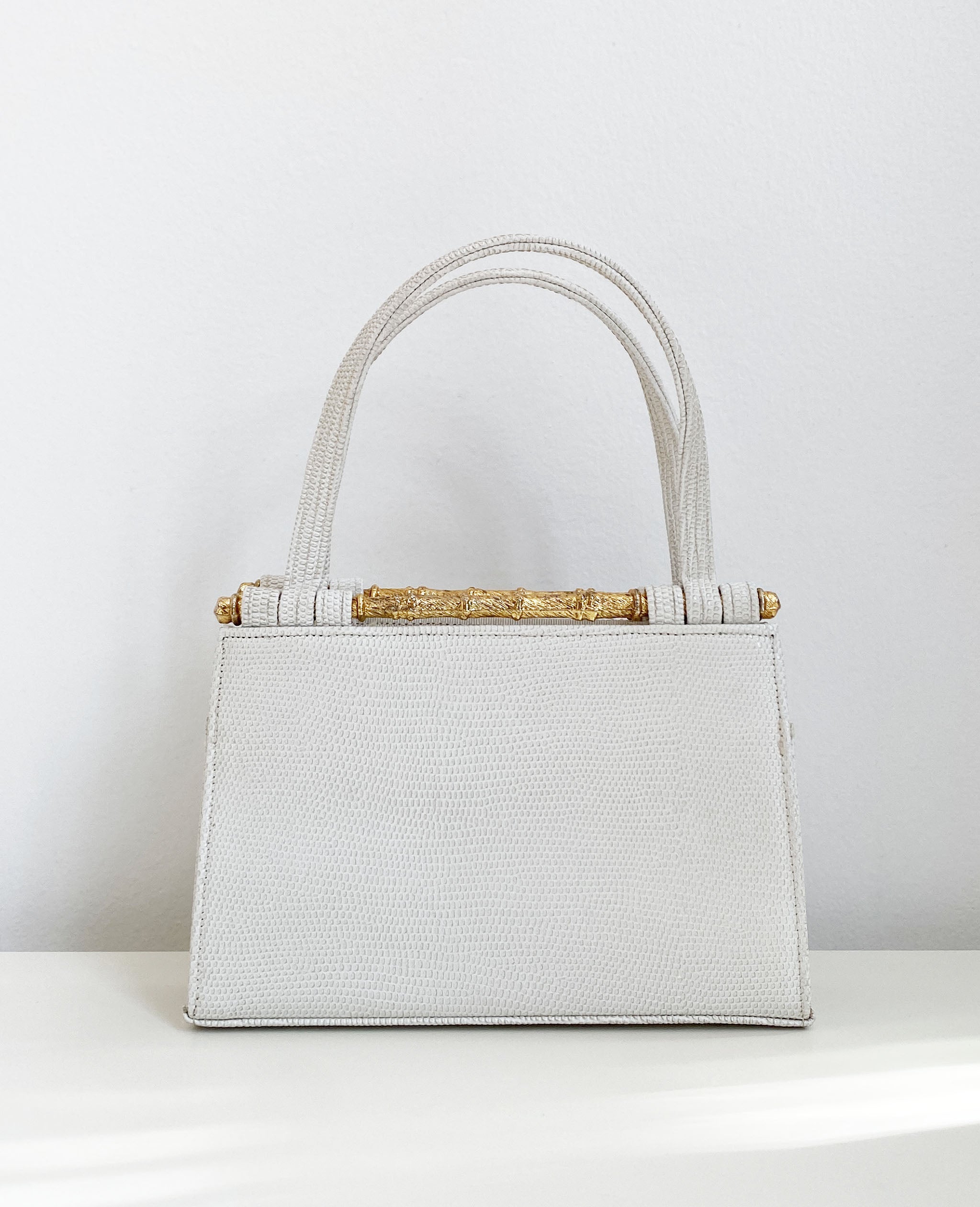 White Embossed Handbag