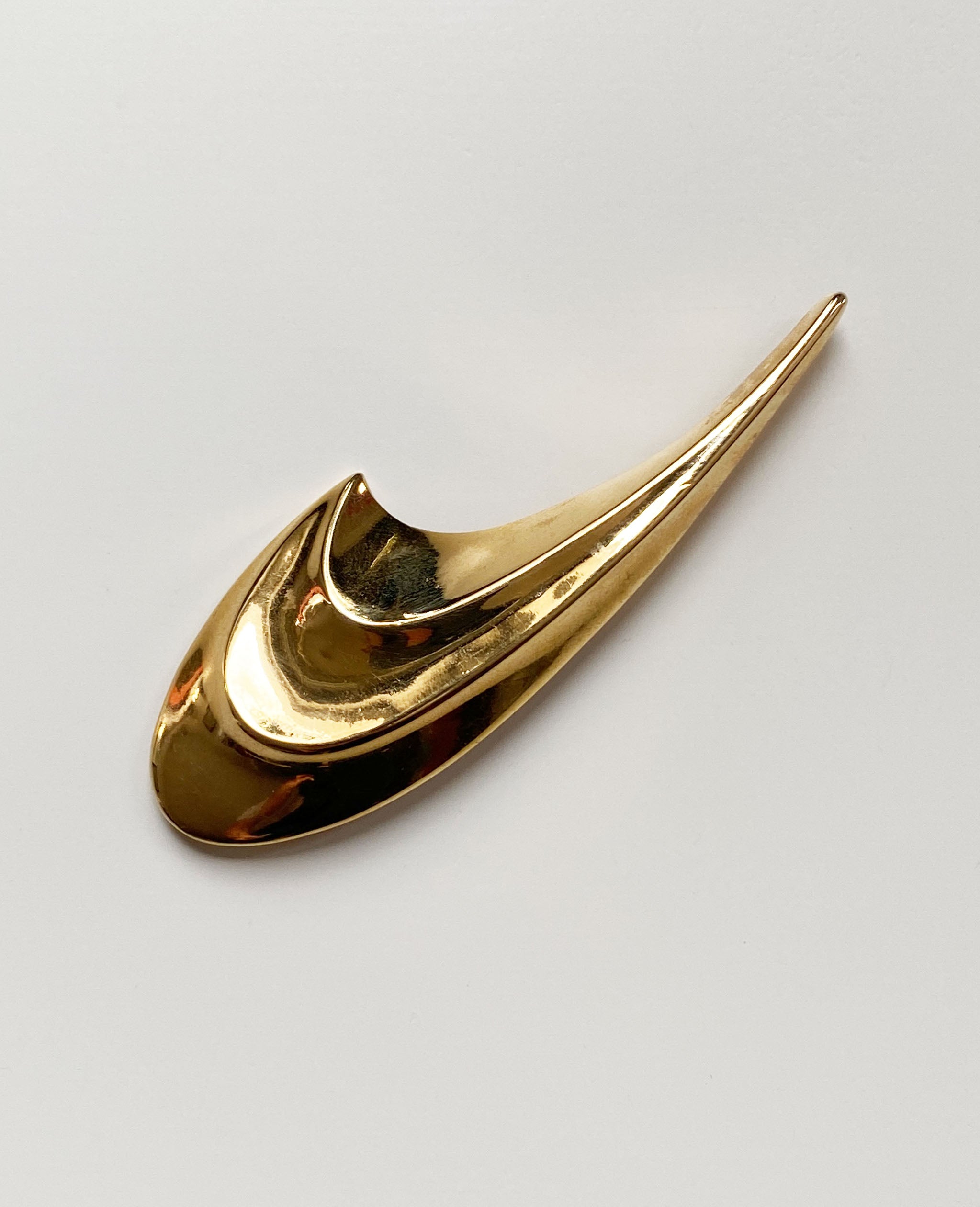Gold Swoosh Pin